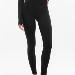 Athleta Black Salutation Stash Tight Leggings